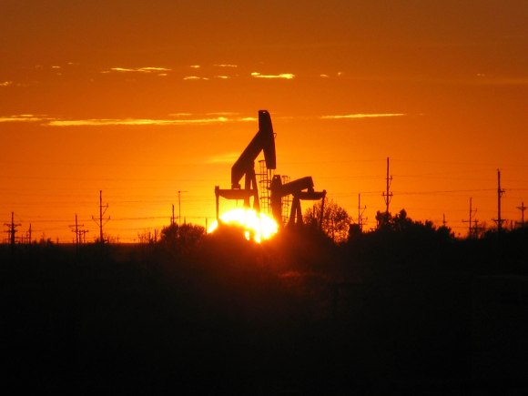 The sun sets behind a pump jack in Texas. The National Institute for Occupational Safety and Health (NIOSH) is involved in researching safety for oil rig workers, who carry out risky jobs in dangerous environments. Photo by NIOSH, public domain