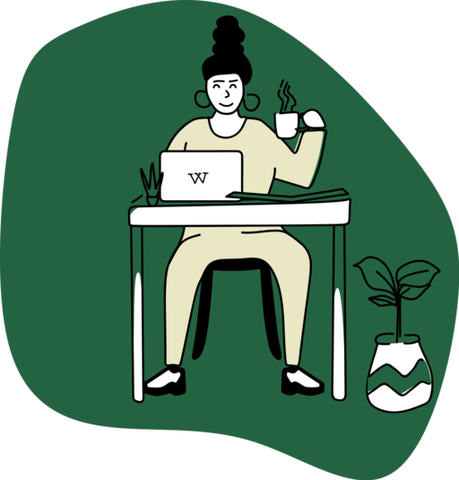 A person drinking a hot drink while sitting at a laptop